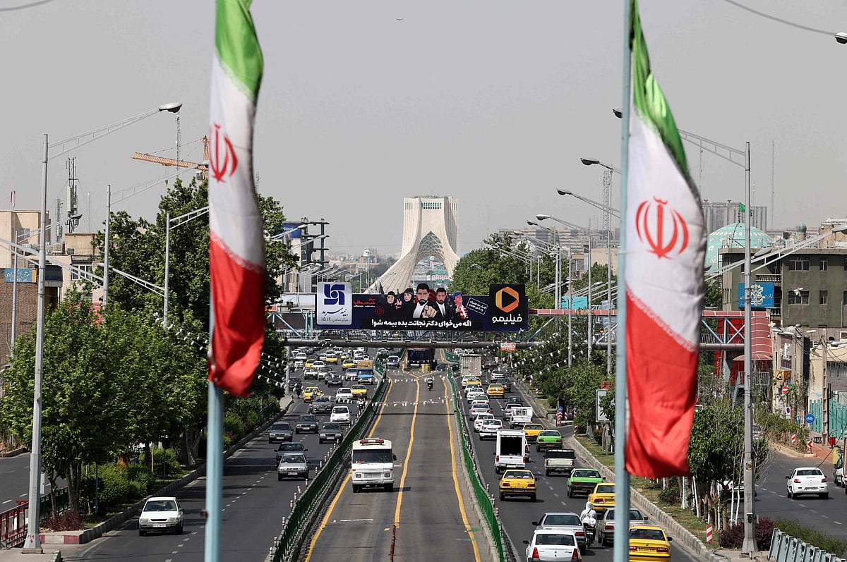 National flags of Iran fly above Azadi avenue in Tehran, Iran on Saturday, 3 November 2018.