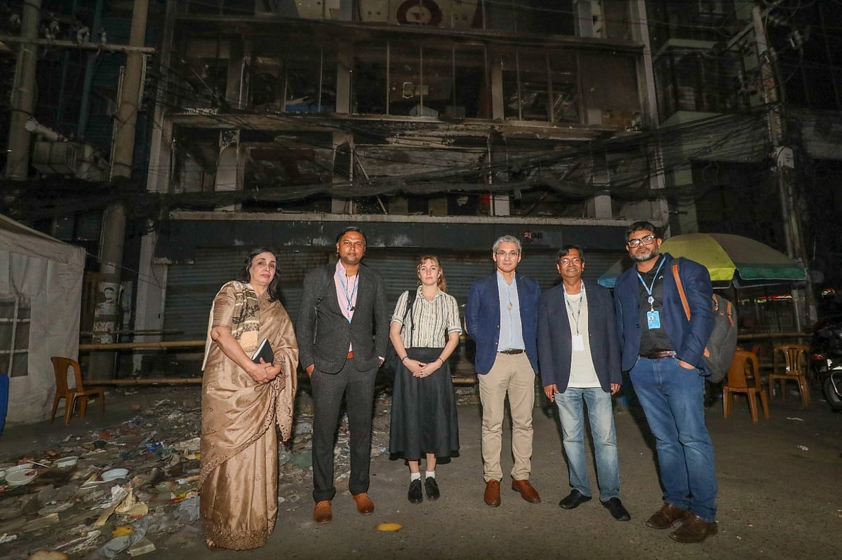 Mehdi Benchelah, head of the Freedom of Expression, Rule of Law and Safety of Journalists team at UNESCO headquarters (Paris), visits the damaged Prothom Alo office in Karwan Bazar in the evening, accompanied by his colleagues on Saturday.