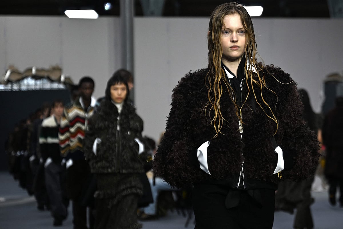 Models present a creation by Sacai for the Menswear Ready-to-wear Fall-Winter 2026/2027 collection as part of the Men Paris Fashion Week in Paris on 25 January, 2026.