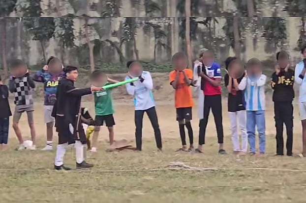 DUCSU member Sarba Mitra Chakma makes adolescents and young men do squats while holding their ears at Dhaka University.