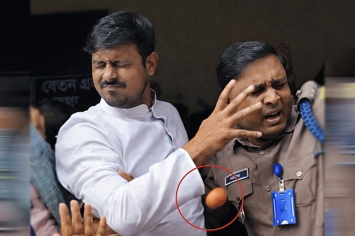 Eggs are thrown at Nasiruddin Patwari, candidate of the 11-party electoral alliance, at Habibullah Bahar University College in Shantinagar of the capital on 27 January 2026.