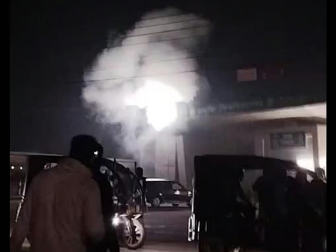 Smoke spread after a crude bomb exploded in front of the main gate of Gopalganj University of Science and Technology on the night of 26 January 2026.