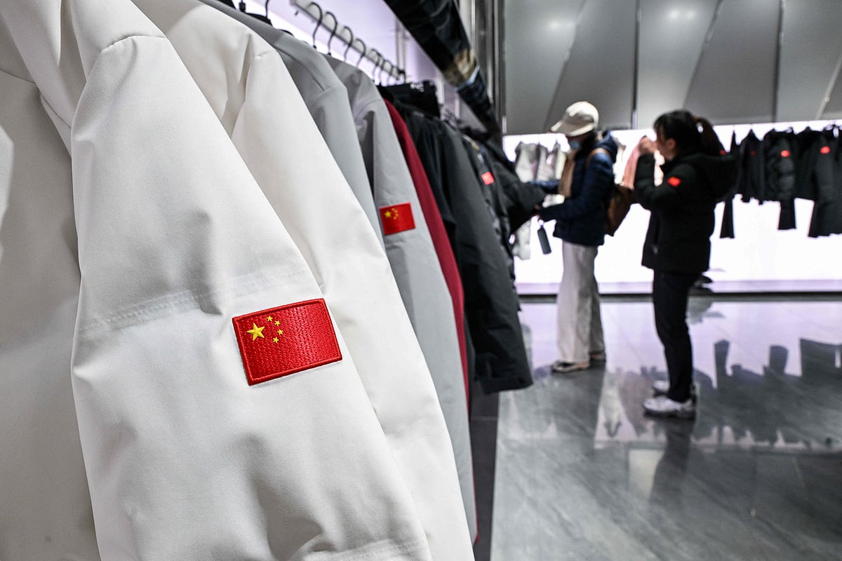 Customers browse in an Anta store in the Huangpu district of Shanghai on January 27, 2026