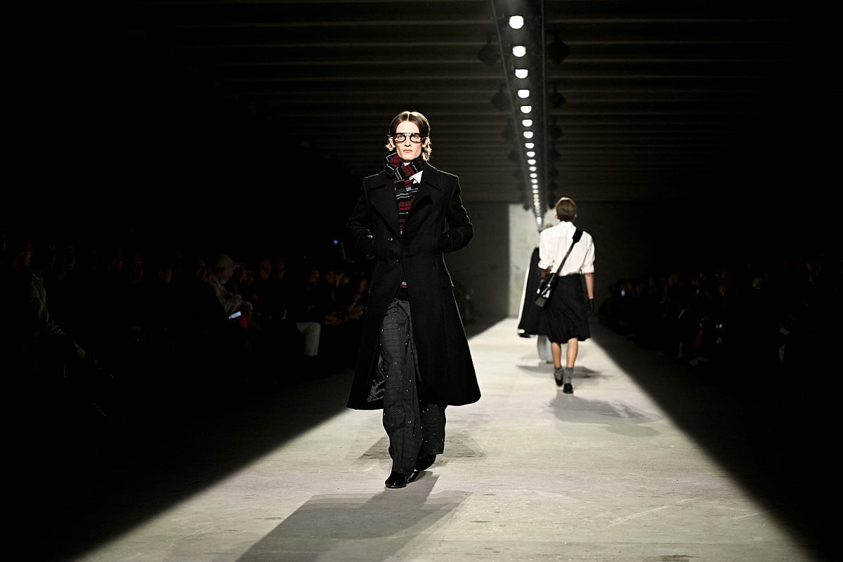 Models present creations by Dries Van Noten for the Menswear Ready-to-wear Fall-Winter 2026/2027 collection as part of the Men Paris Fashion Week in Paris on 22 January, 2026.