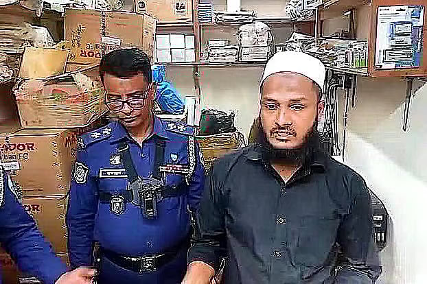 Police arrest shop owner Sohel Rana and seized illegal voting seals from his possession in Lakshmipur