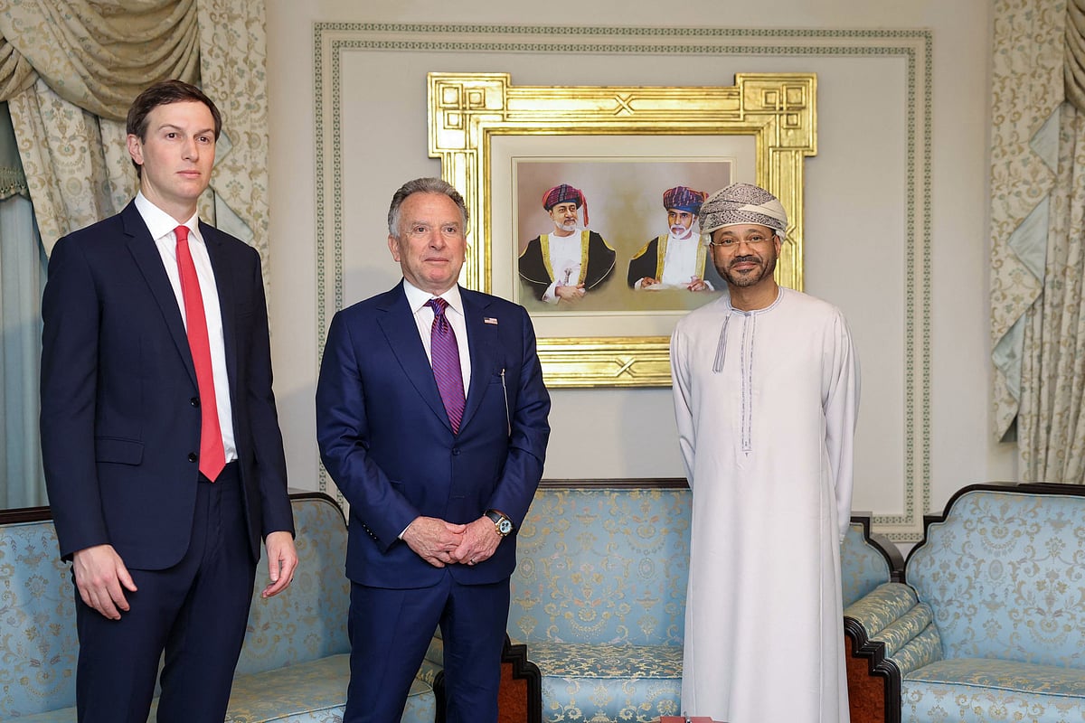 In this handout photo released by the Omani Ministry of Foreign Affairs on 6 February, 2026, US special envoy Steve Witkoff (C), Jared Kushner and Oman’s Foreign Minister Badr bin Hamad al-Busaidi pose for a photo during a meeting in Muscat.