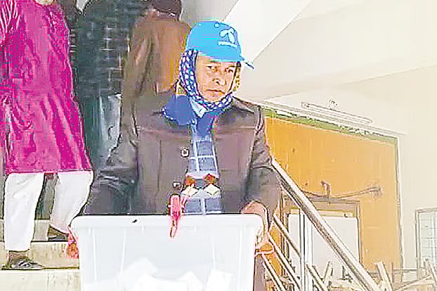 An image captioned: “Before polling started on the morning of 30 December 2018, in the election known as the ‘Nighttime Vote,’ a camera of a BBC correspondent in Chattogram captured ballot boxes already filled with ballots.”