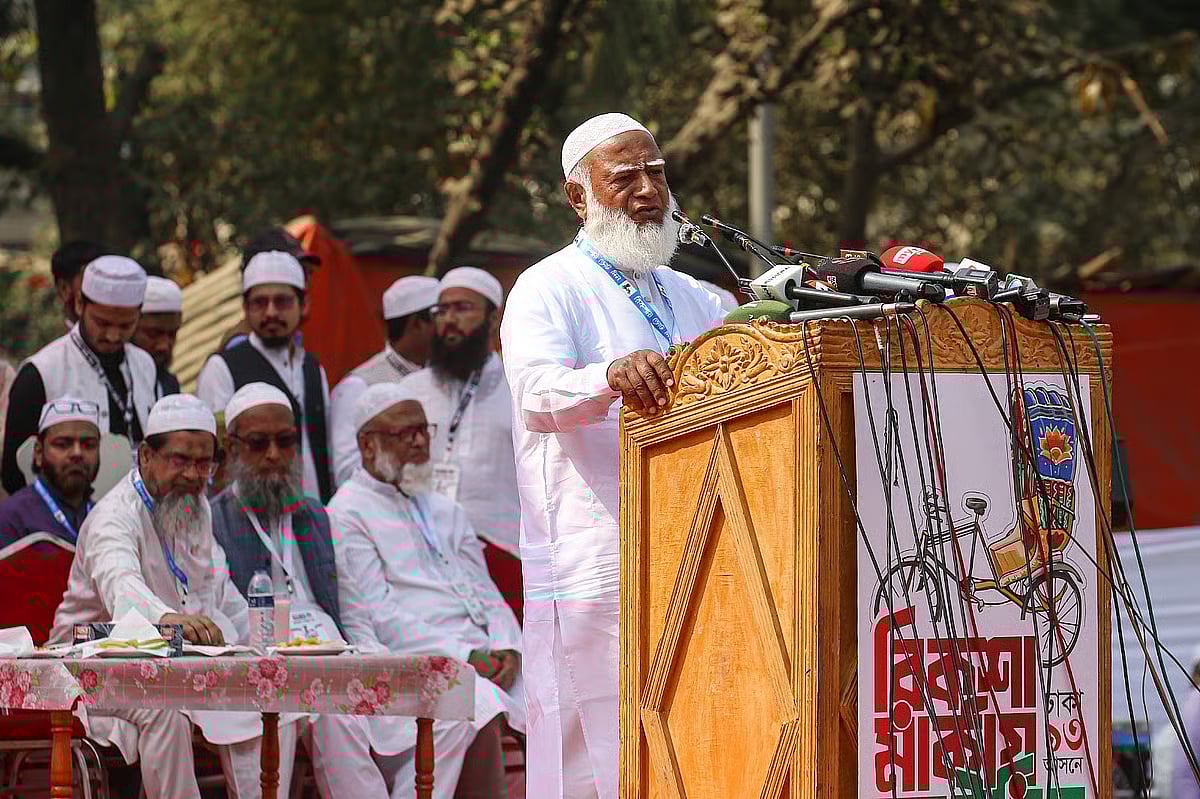 Jamaat-e-Islami ameer Shafiqur Rahman addresses an election rally of Bangladesh Khelafat Majlis ameer Mamunul Haque, the candidate of the 11-party electoral alliance in the Dhaka-13 constituency, at the Mohammadpur central eidgah ground in the capital on Monday afternoon