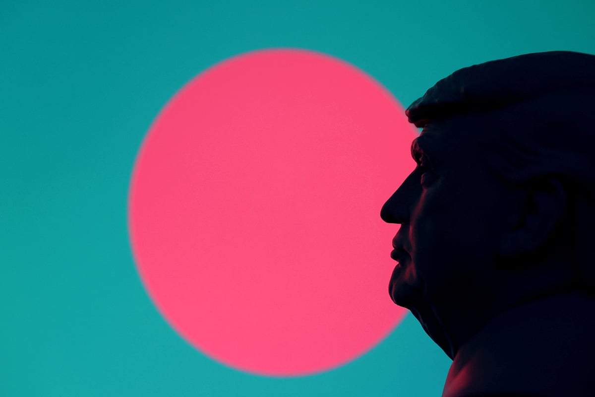 Illustration shows 3D-printed miniature model of U.S. President Donald Trump, Bangladesh flag
