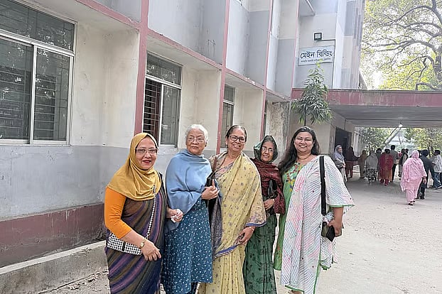 Several voters leave after casting their ballots at the Dhanmondi Government Girls’ School polling centre. Photo taken Thursday morning.