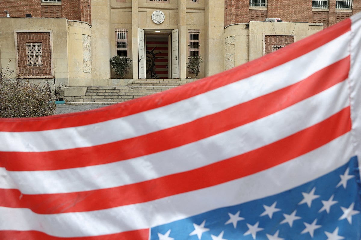 An upside-down U.S flag flutters at the former United States Embassy in Tehran, Iran, 5 February 2026.
