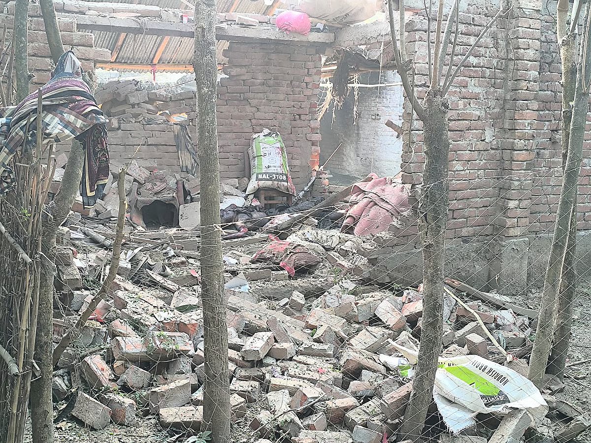 The brick walls of this house collapsed and the tin roof was blown off in the  explosion in Chapainawabganj.
