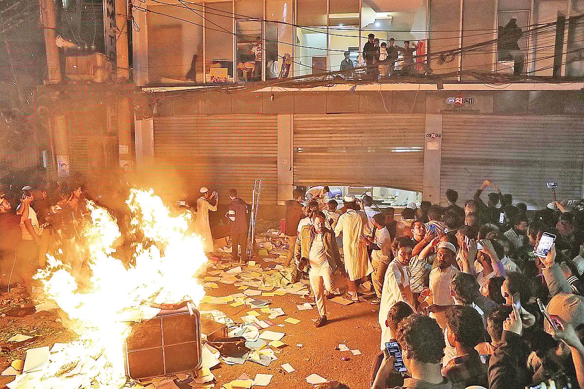 After looting and vandalising, the miscreants set the furniture and important documents on fire at 12:06 am