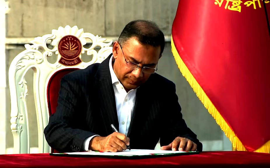 Tarique Rahman signs after taking oath as Prime Minister
