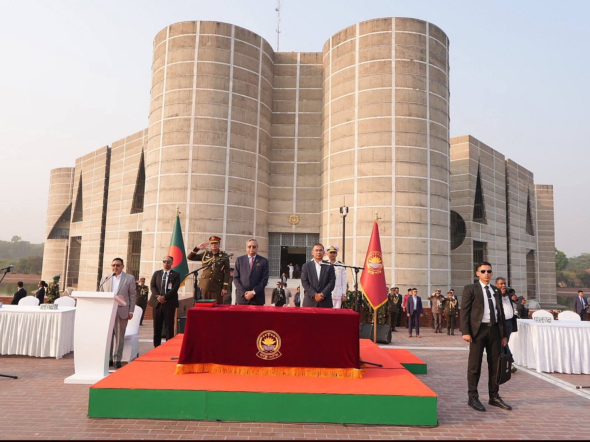 Bangladesh Nationalist Party (BNP) chairman Tarique Rahman (R) takes oath as prime minister during a swearing-in ceremony at the National Parliament building in Dhaka on 17 February 2026