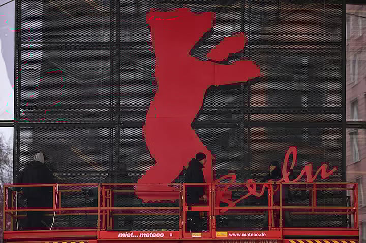 Workers mount the bear logo at the venue entrance of the "Berlinale Palast" for the Berlinale International Film Festival in Berlin, Germany, 6 February, 2026.