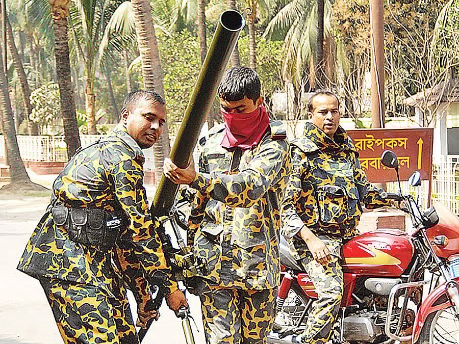 BDR jawans with heavy arms at Pilkhana, Dhaka