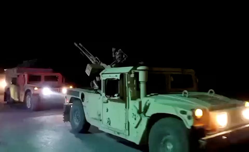 Military vehicles move on a road in a location given as Nangarhar, Afghanistan, in this screengrab from a handout video released on 26 February, 2026. Pakistani and Afghan border forces clashed on Thursday night after the Taliban launched what it called retaliatory strikes on Pakistani installations, sharply escalating tensions after days of cross-border hostilities.