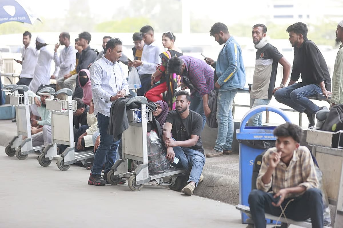 Passengers wait outside Hazrat Shahjalal International Airport on 1 March, 2026