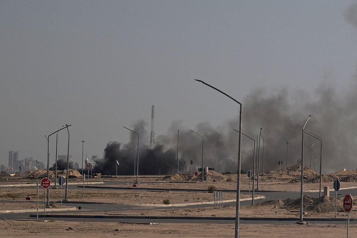Smoke rises from a reported Iranian strike in the area where the US Embassy is located in Kuwait City on 2 March, 2026. Black smoke was seen rising from the US embassy in Kuwait City on 2 March after the latest volley of Iranian strikes, an AFP correspondent saw.