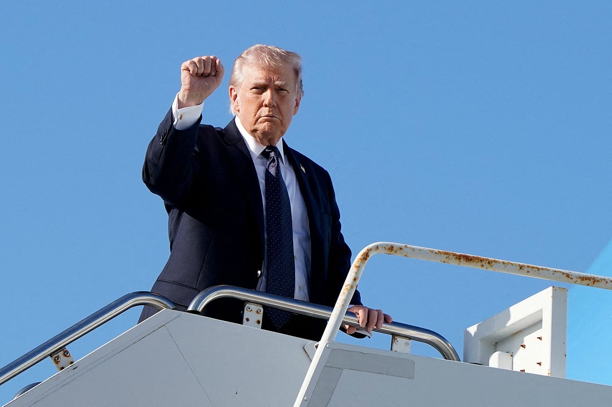 US President Donald Trump gestures as he boards Air Force One at Palm Beach International Airport in West Palm Beach, Florida, US, on 1 March 2026.