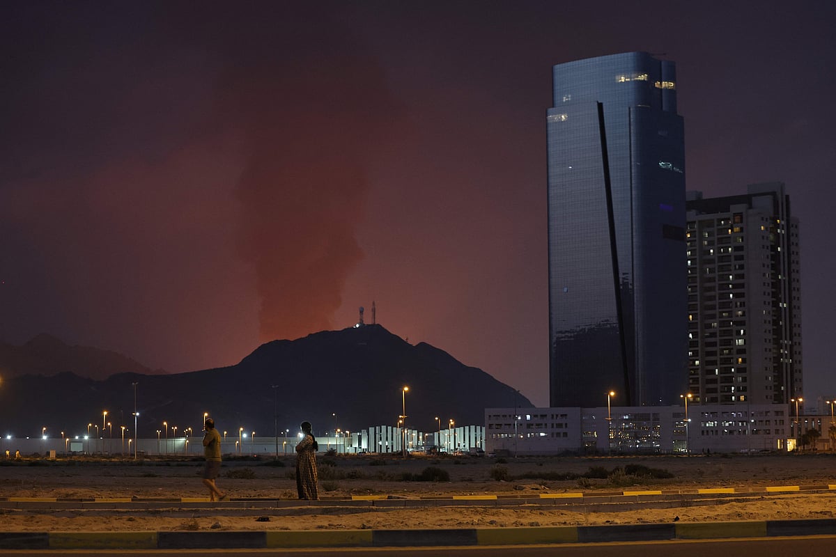 A tall plume of black smoke ascends following an explosion in the Fujairah industrial zone in UAE on 3 March, 2026.