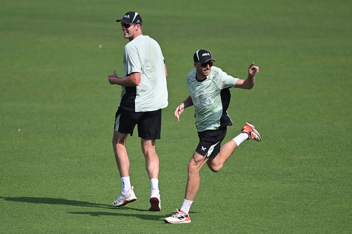 New Zealand's captain Mitchell Santner (R) and Kyle Jamieson (L) attend a training session on the eve of their 2026 ICC Men's T20 Cricket World Cup semi final match aginst South Africa at the Eden Gardens in Kolkata on 3 March, 2026.