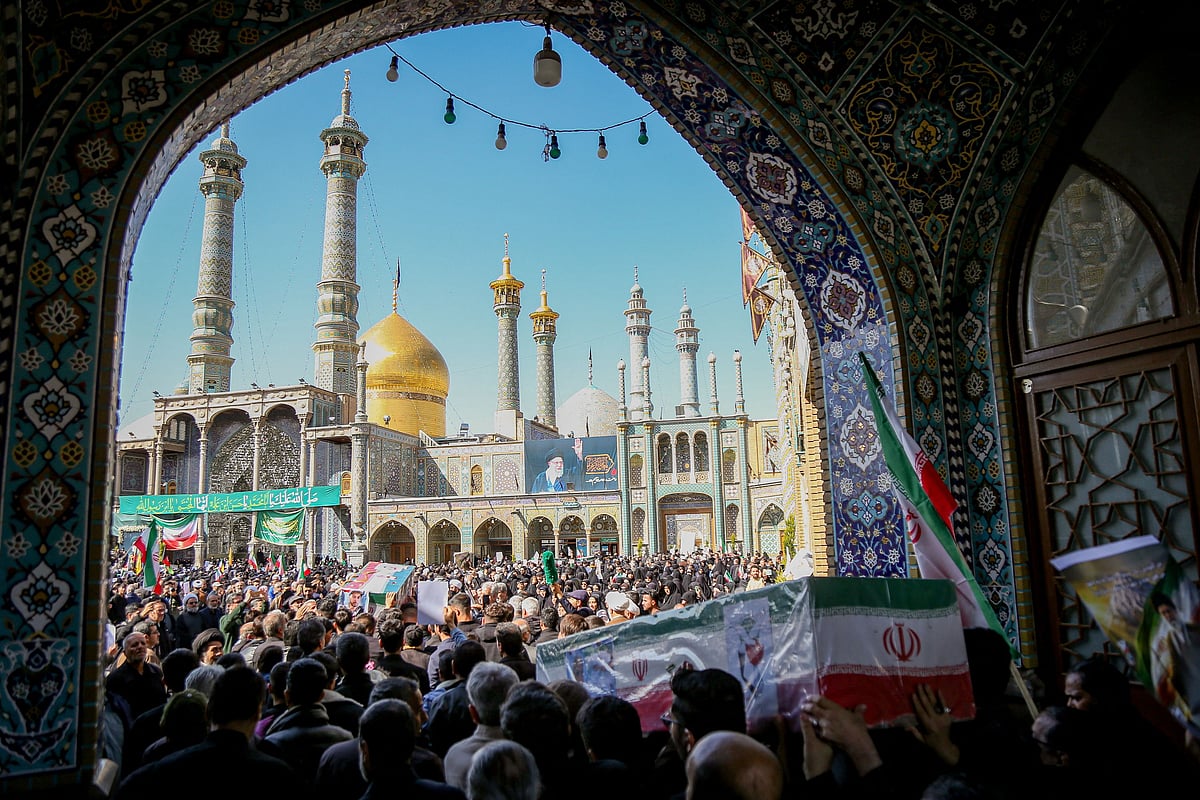 In this picture obtained from Iran's ISNA news agency on March 5, 2026, mourners in the city of Qom attend the funeral of those killed in the US-Israeli war with Iran.