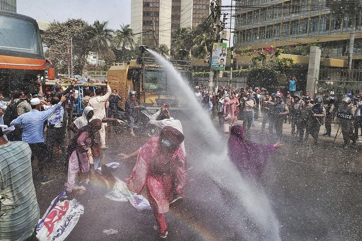 Law enforcers use water cannons to disperse protesters in front of Bangladesh Bank on 5 March.
