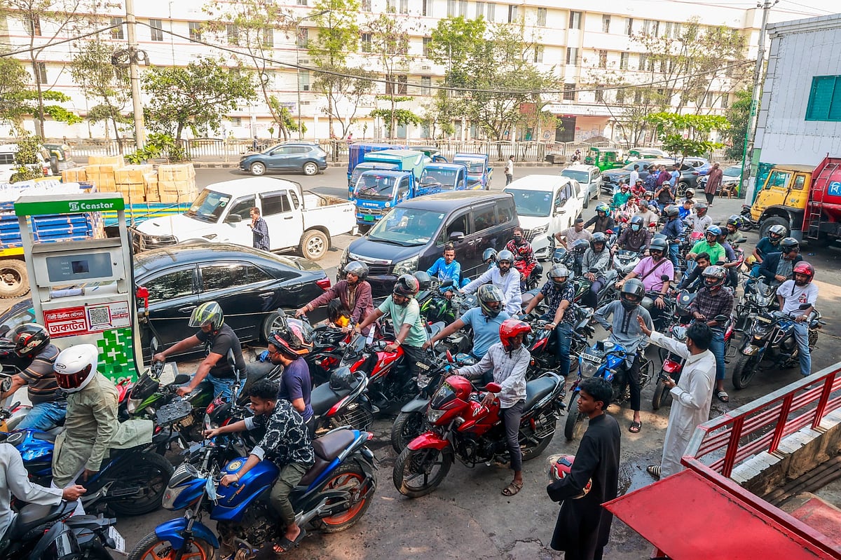 Long queue of cars and motorcycles at Khalek Service Centre, Darus Salam, Dhaka as people started panic buying of fuel for their vehicles. The photo is taken on 6 March 2026