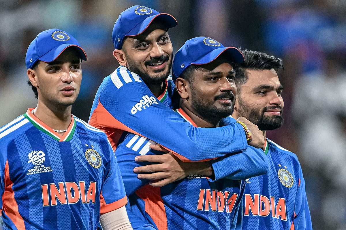 (L-R) India's Abhishek Sharma, Axar Patel, Sanju Samson and Rinku Singh celebrate after their team's win in the 2026 ICC Men's T20 Cricket World Cup semi-final match against England at the Wankhede Stadium in Mumbai on 5 March, 2026.