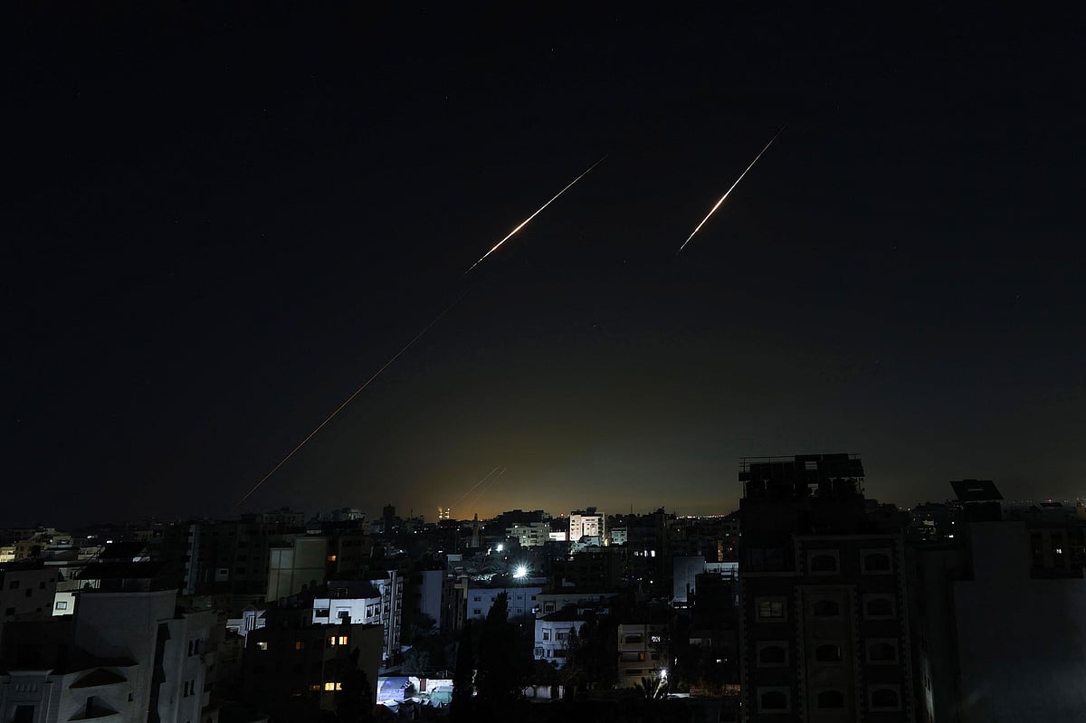 Iranian projectiles leave behind trails in the sky as seen from Gaza City on March 5, 2026. The raging Iran war, which has spread across the Middle East and beyond, entered its seventh day on March 6 after Israeli forces announced a "next phase" in the conflict and bombed Beirut's southern suburbs.
