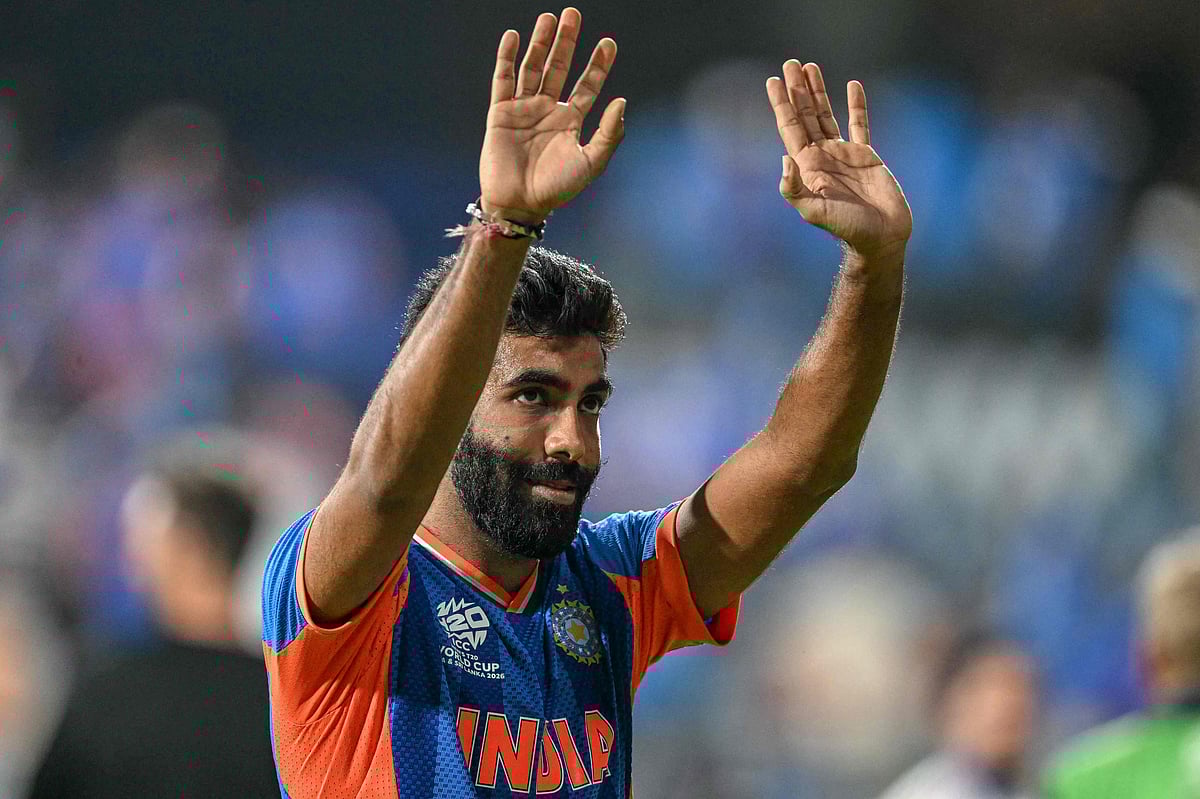 India's Jasprit Bumrah waves to fans at the end of the 2026 ICC Men's T20 Cricket World Cup semi-final match between India and England at the Wankhede Stadium in Mumbai on 5 March, 2026.