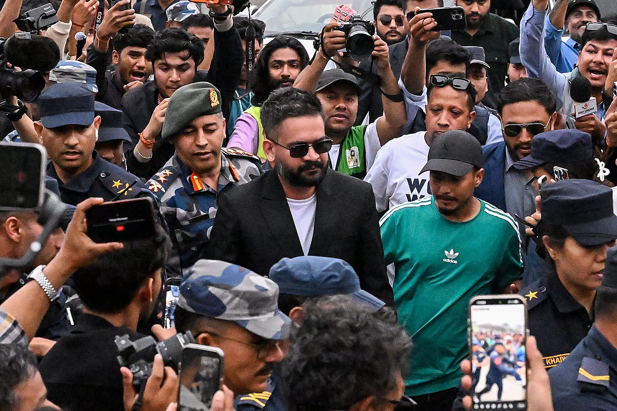Rastriya Swatantra Party (RSP) election candidate Balendra Shah (C) arrives at the counting centre to collect a certificate after his victory in parliamentary elections at Damak in Jhapa district on 7 March, 2026