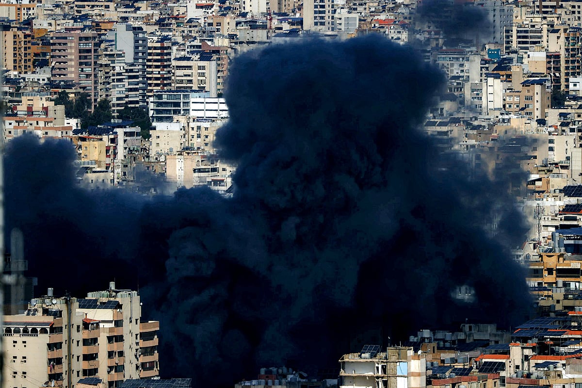 A smoke cloud erupts from the site of an Israeli airstrike on Beiruts southern suburbs on 9 March, 2026.