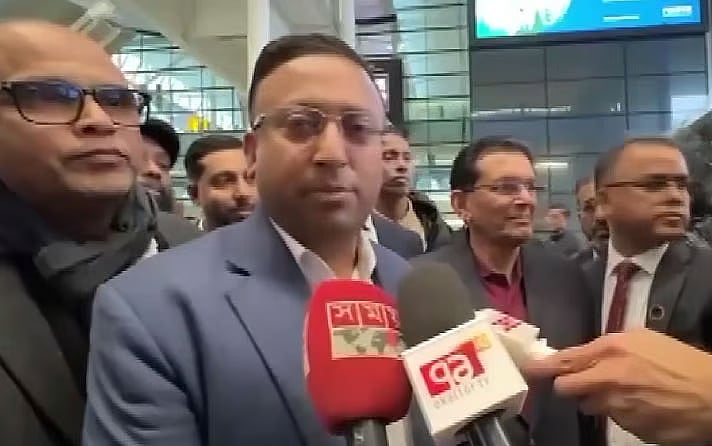 Humayun Kabir speaks with media after arriving at Heathrow airport