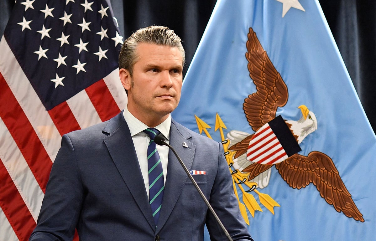 US Defense Secretary Pete Hegseth and CENTCOM commander Admiral Brad Cooper hold a news conference