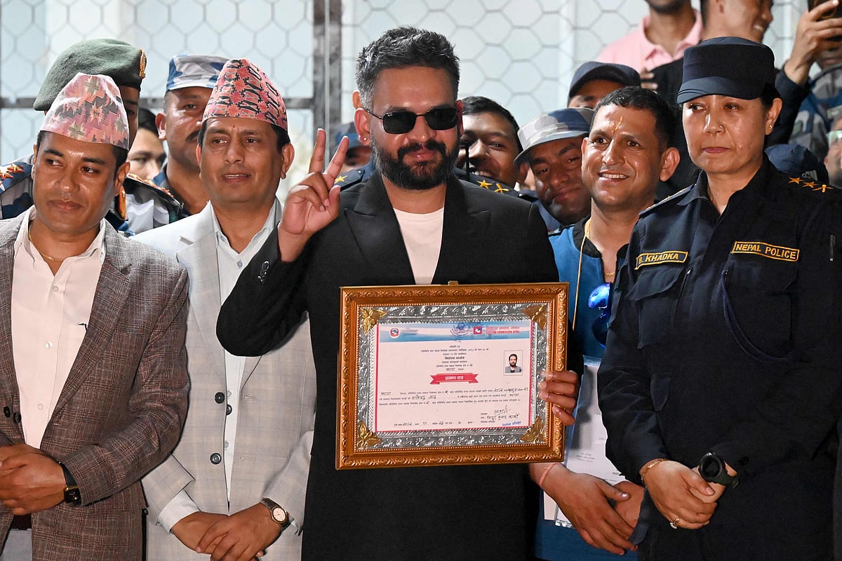Rastriya Swatantra Party (RSP) election candidate Balendra Shah shows a victory sign after collecting a certificate following his win in parliamentary elections at the counting centre in Damak in Nepal's Jhapa district on 7 March, 2026.