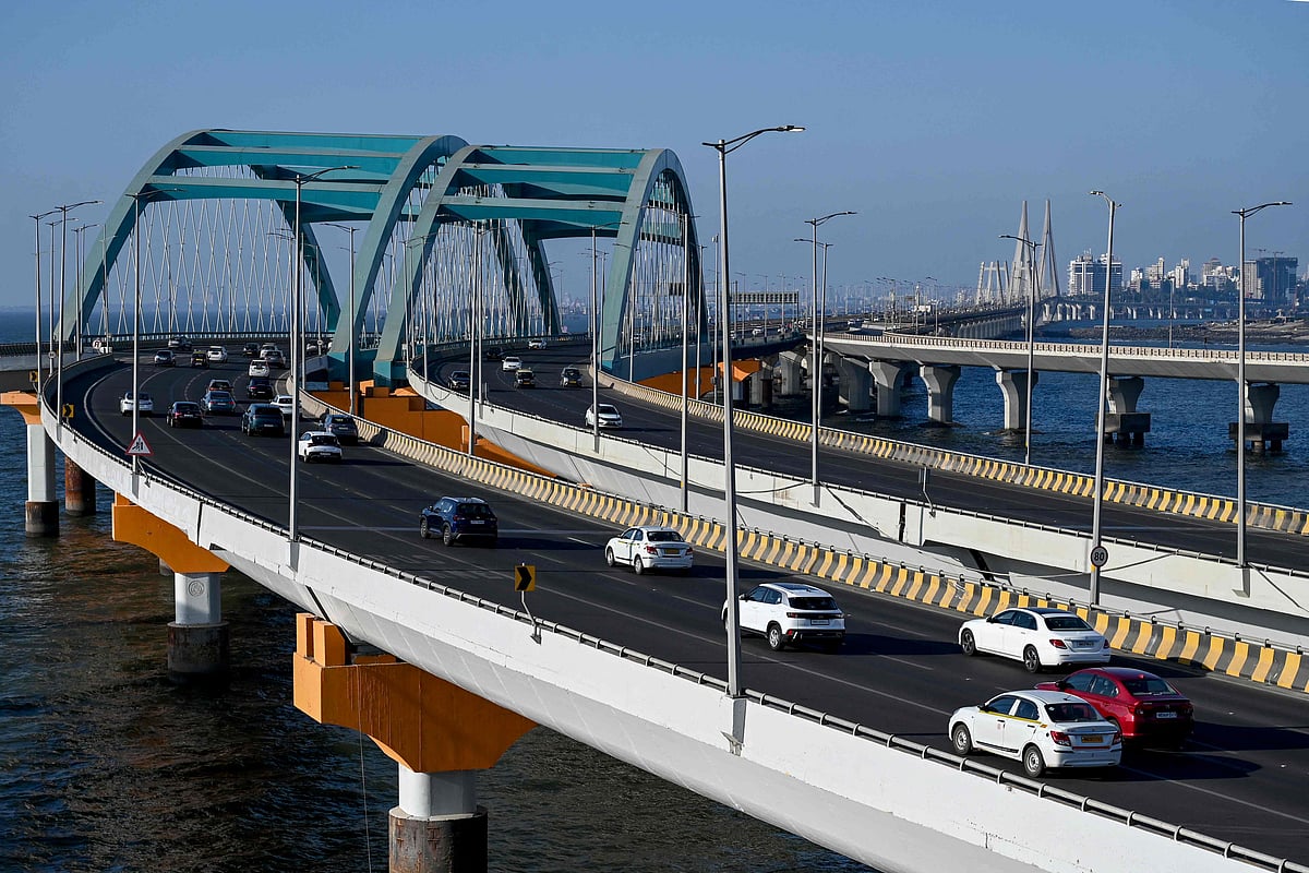 Vehicles ply on the coastal road connecting with the Bandra-Worli sea link bridge in Mumbai on 26 February 2026.