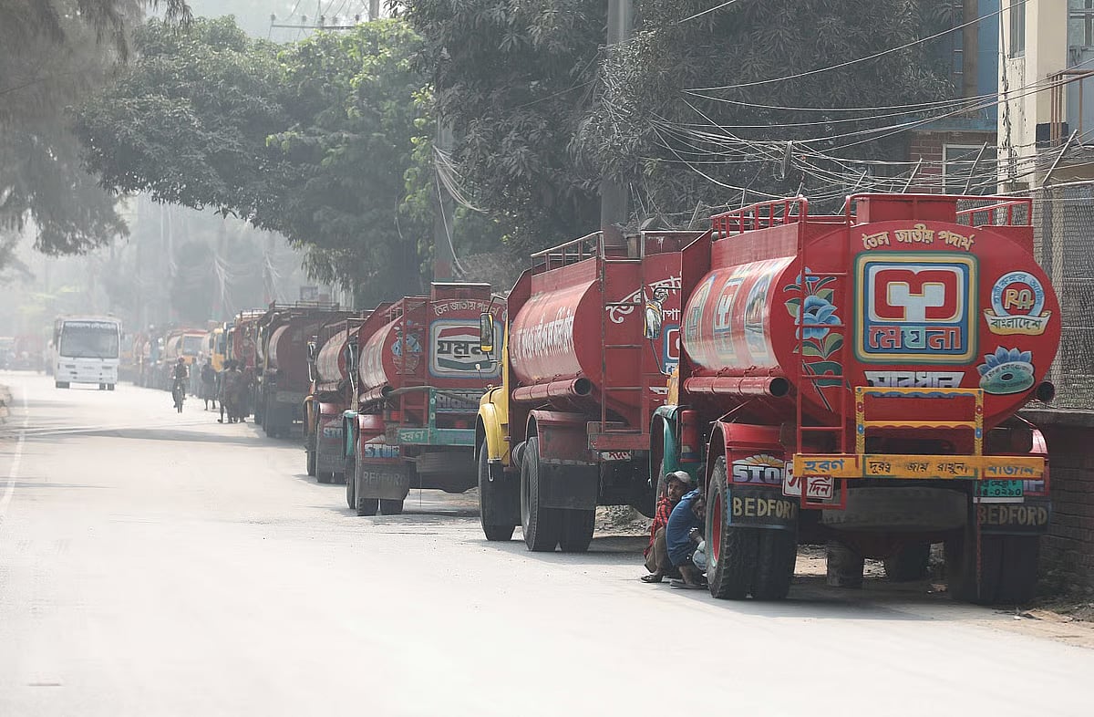 Oil tankers wait in front of a depot to collect fuel, in the Patenga area of Chattogram city at 10:00 am on 11 March 2026.