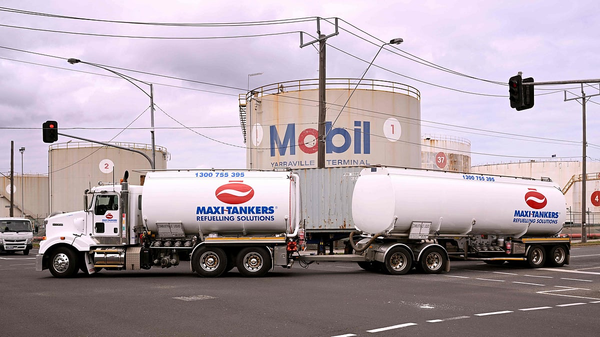 A fuel tanker passes the Mobil fuel distribution centre in the Melbourne suburb of Yarraville on March 12, 2026 as the demands and prices of petrol and diesel soar due to the Middle East conflict. Global oil prices have climbed dramatically since the war, prompting warnings that high fuel prices could drive inflation above 5 per cent in Australia.