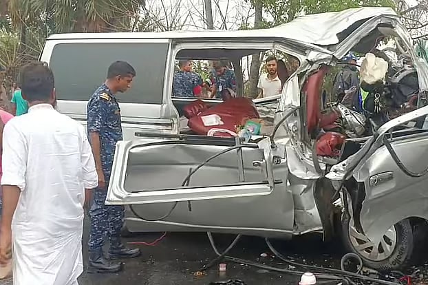The microbus was completely crushed in the accident. The incident occurred on Thursday afternoon in the Belaibridge area of Rampal, Bagerhat.