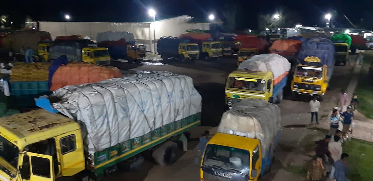 Photo shows goods-laden trucks