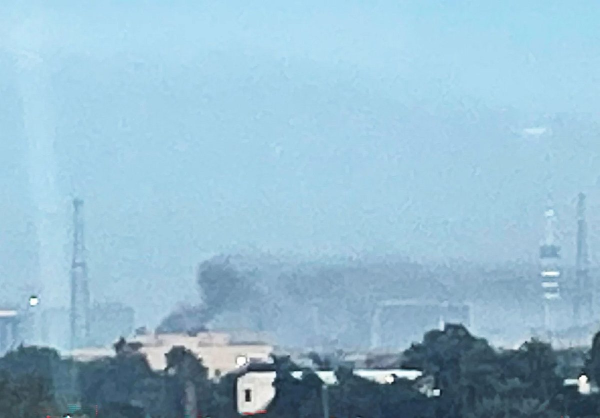 Smoke rises following a drone attack on the US embassy in Baghdad on 14 March 2026. 
