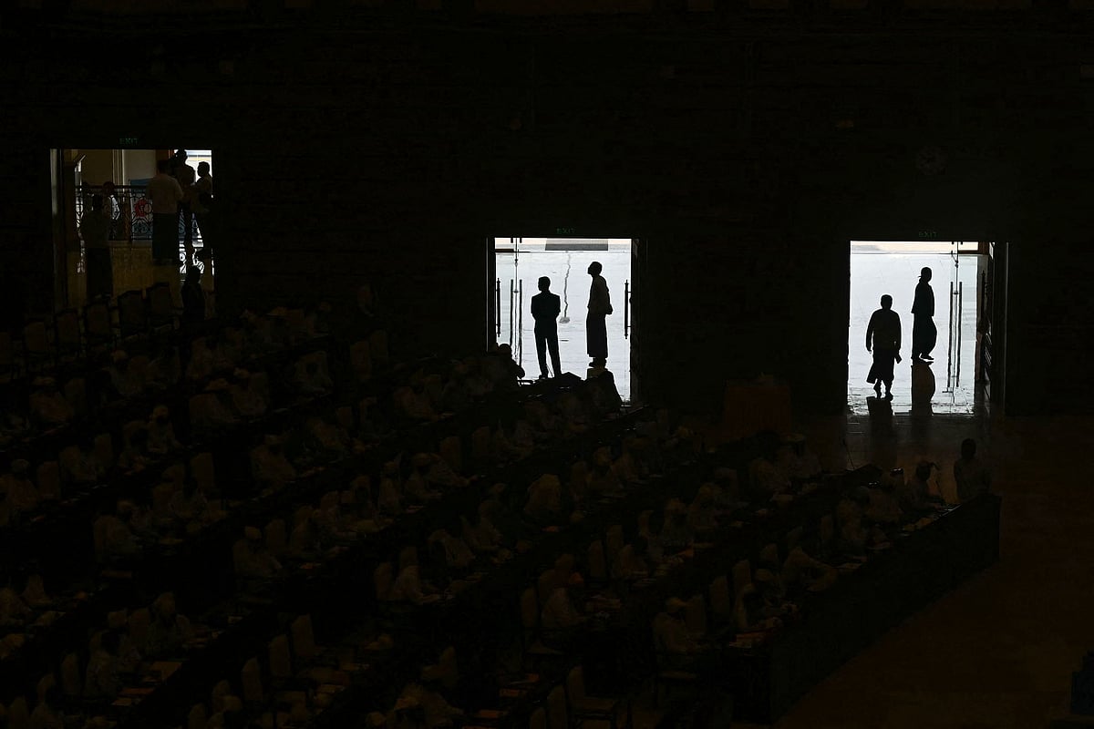 Members of Myanmar's parliament attend a session of the third term of the Pyithu Hluttaw (House of Representatives) in Naypyidaw on March 16, 2026. Myanmar parliament convened on March 16 for the first time since a 2021 military coup, AFP journalists saw, packed with pro-junta lawmakers elected in a poll choreographed by the top brass.