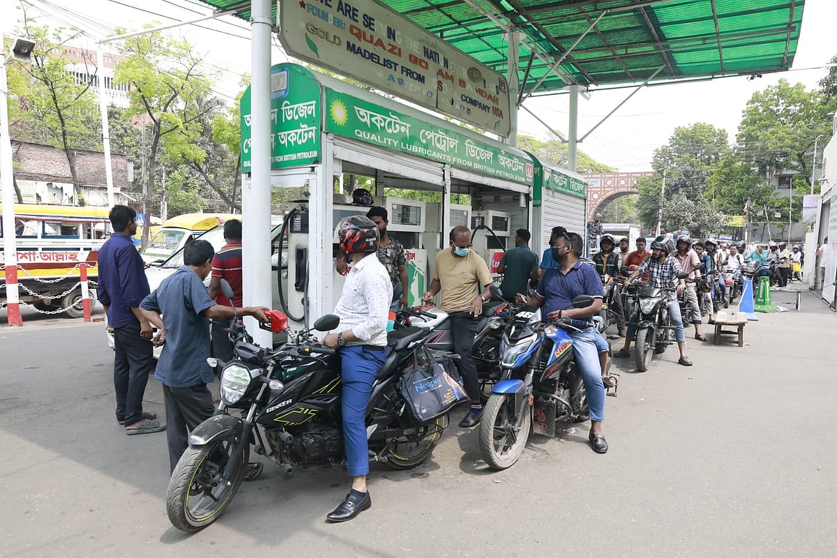 Motorcyclists wait in queue for fuel oil at a petrol pump at Asad Gate, Dhaka on 18 March 2026