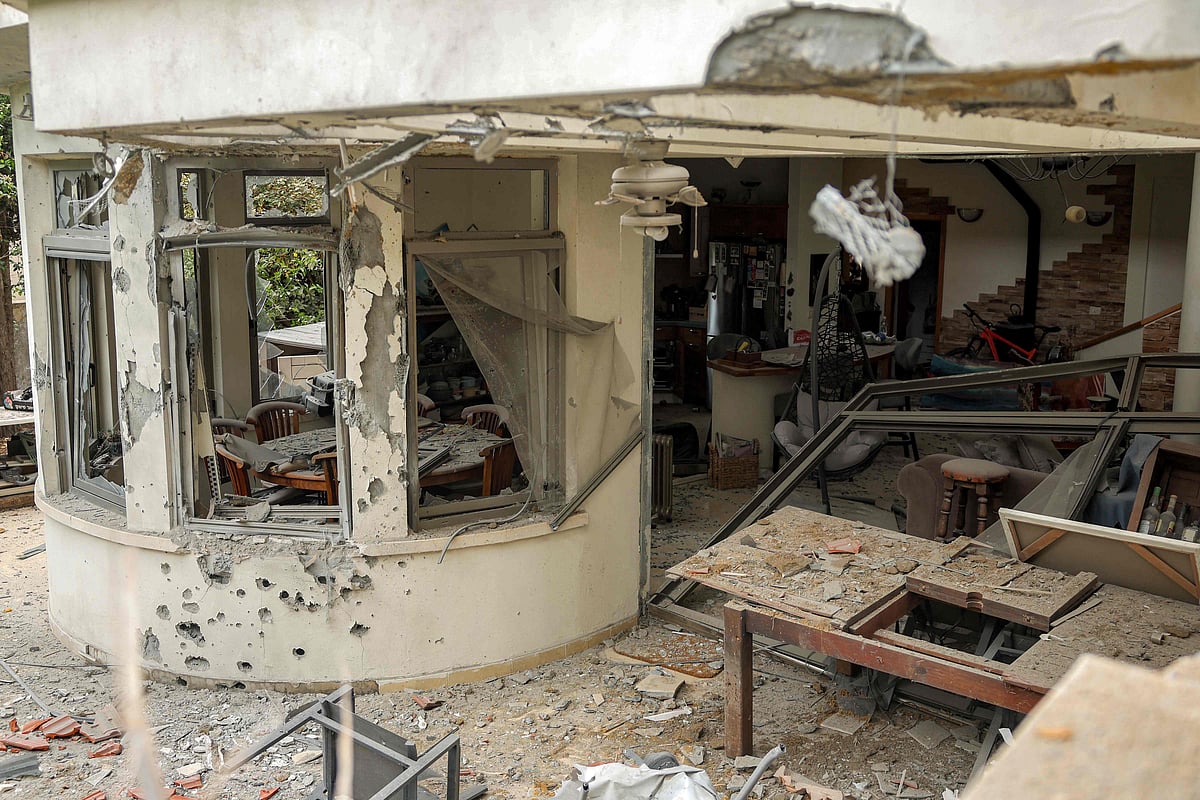 A house damaged by an Iranian projectile strike is pictured in a residential neighbourhood in Shoham in central Israel on March 16, 2026. On February 28, Israel and the United States launched strikes on Iran, killing its supreme leader Ayatollah and triggering a war that spread across the Middle East.