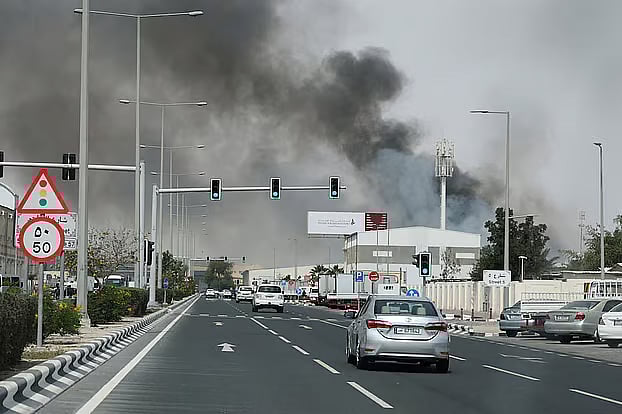 Smoke rises following a missile attack by Iran in Doha, Qatar. 1 March 2026.