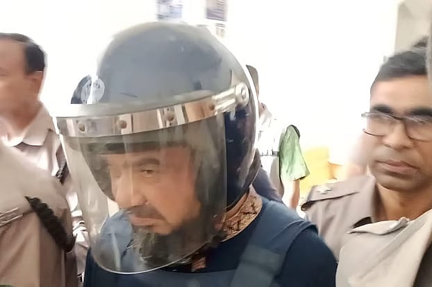 Dismissed Lieutenant Colonel Md. Afzal Nasher was produced in court today, Monday, in connection with a murder case related to the July uprising.