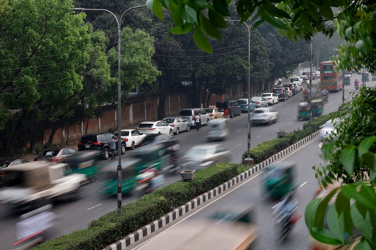 Vehicles stand in a long queue at a fuel station, as concerns grow over fuel supply amid US-Israel conflict with Iran, in Dhaka, Bangladesh, 10 March 2026.